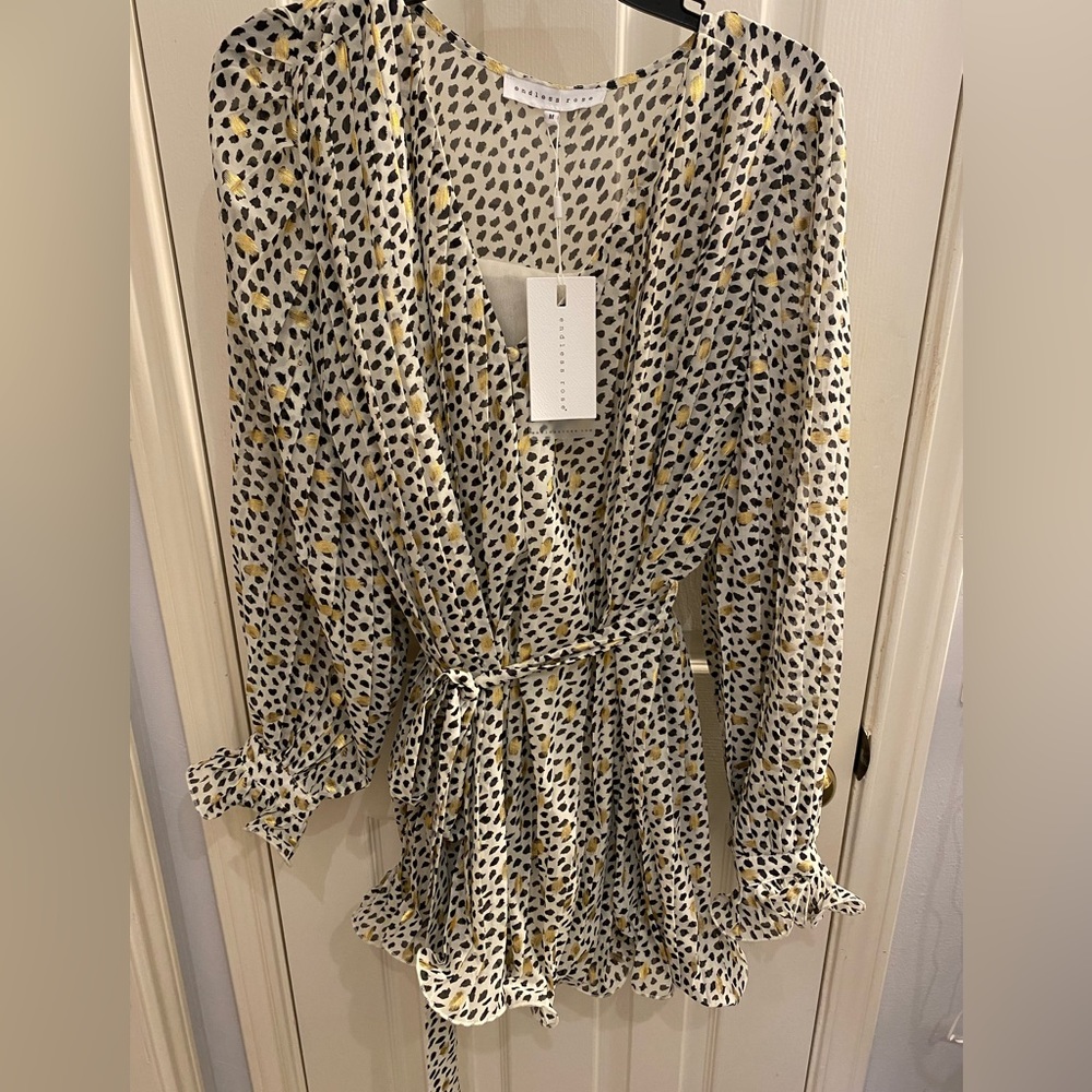 NWT Vici black white and gold long sleeve romper